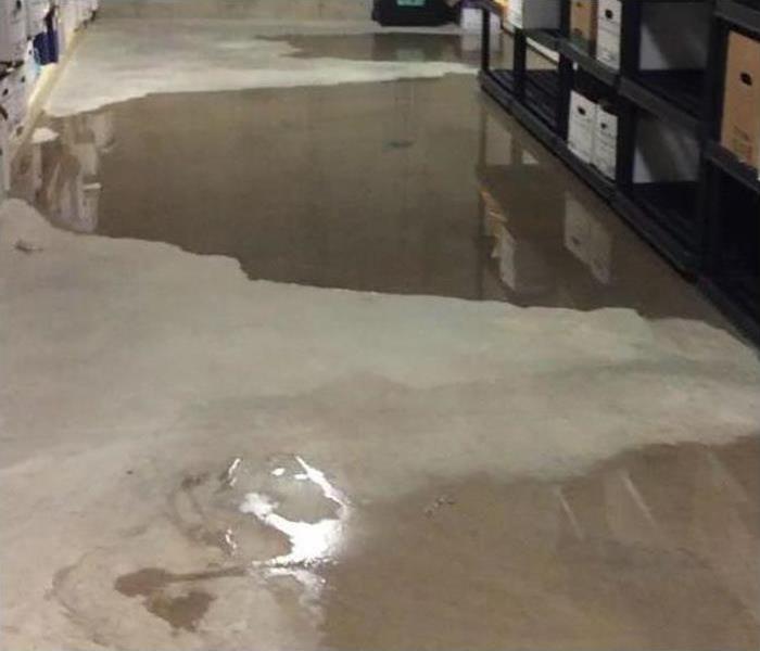 water covering flooring in office