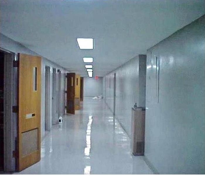 the corridor is sparkling clean, no evidence of a fire