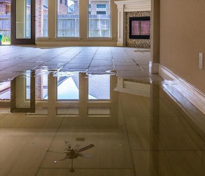water damage on floor inside home